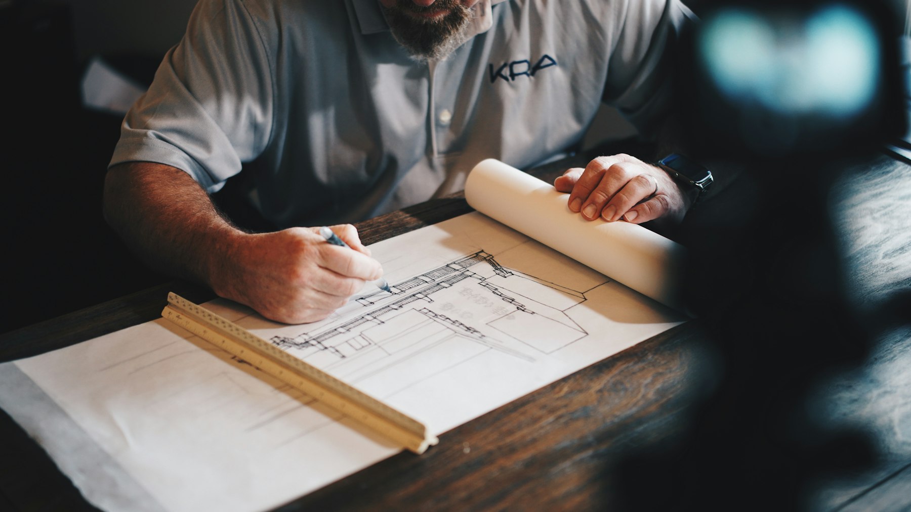 Architect reviewing property development plans